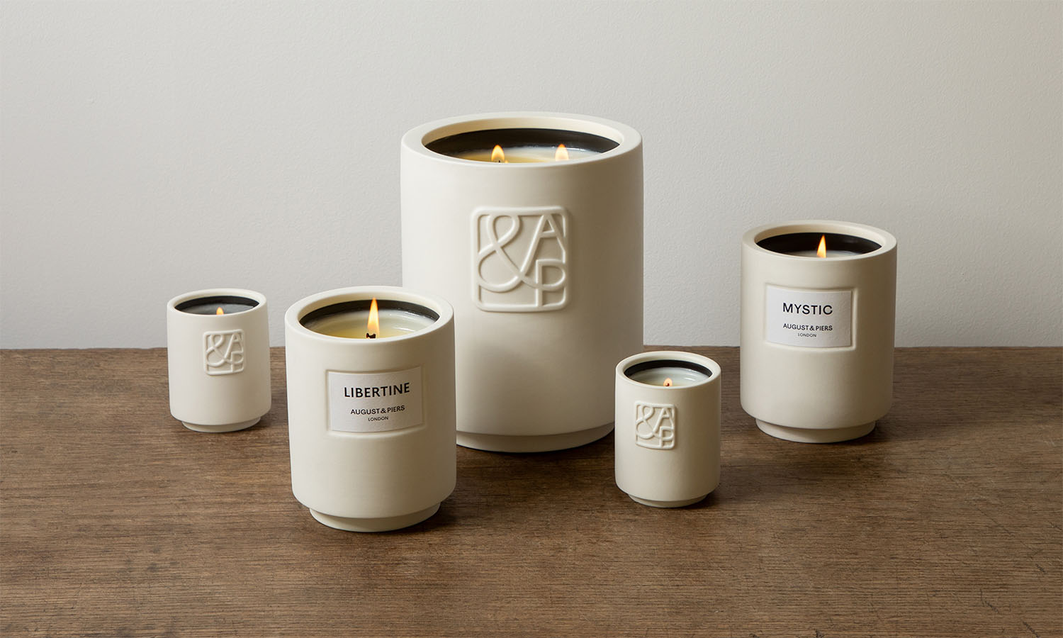 AUGUST&PIERS LIBERTINE and MYSTIC candles – luxury white ceramic home fragrance collection.