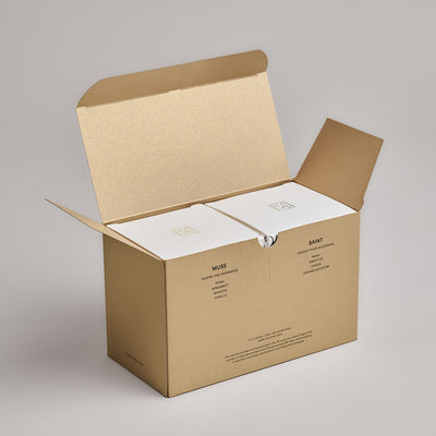 Inside The Inspiring Duo Gift Set, you will find Muse and Saint candles in their original packaging boxes.
