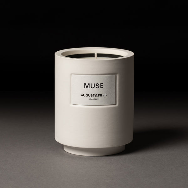 AUGUST&PIERS 340g Muse scented candle with fragrance notes of bergamot, benzoin and vanilla in white ceramic vessel.