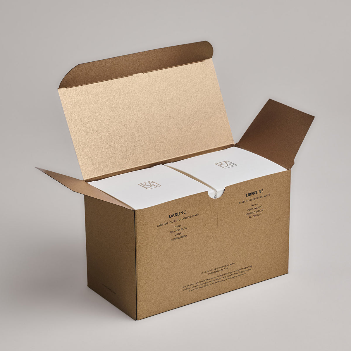 Inside The Iconic Duo Gift Set, you will find Darling and Libertine candles in their original packaging boxes.