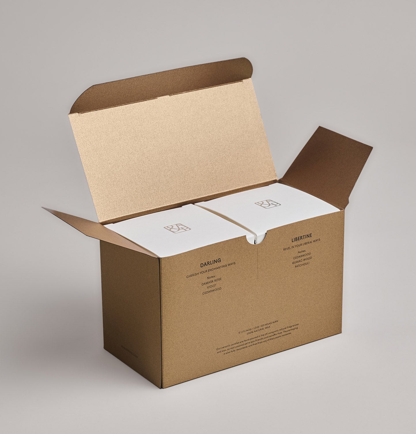 Inside The Iconic Duo Gift Set, you will find Darling and Libertine candles in their original packaging boxes.