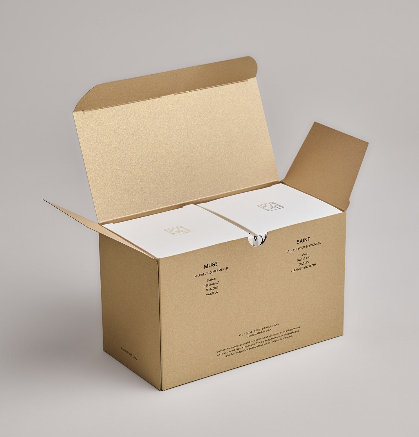 Inside The Inspiring Duo Gift Set, you will find Muse and Saint candles in their original packaging boxes.