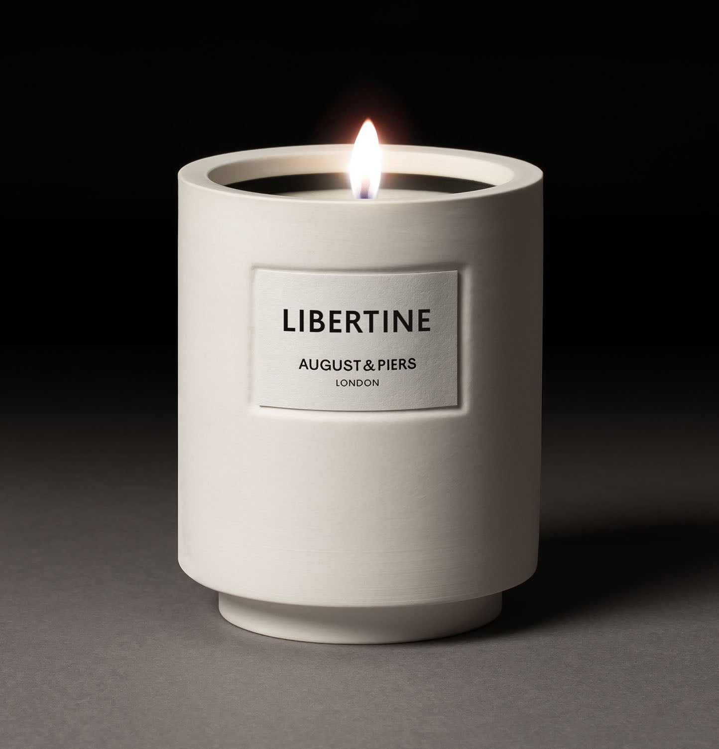 AUGUST&PIERS LIBERTINE luxury scented candle in white ceramic vessel – bold, sensual home fragrance from London.